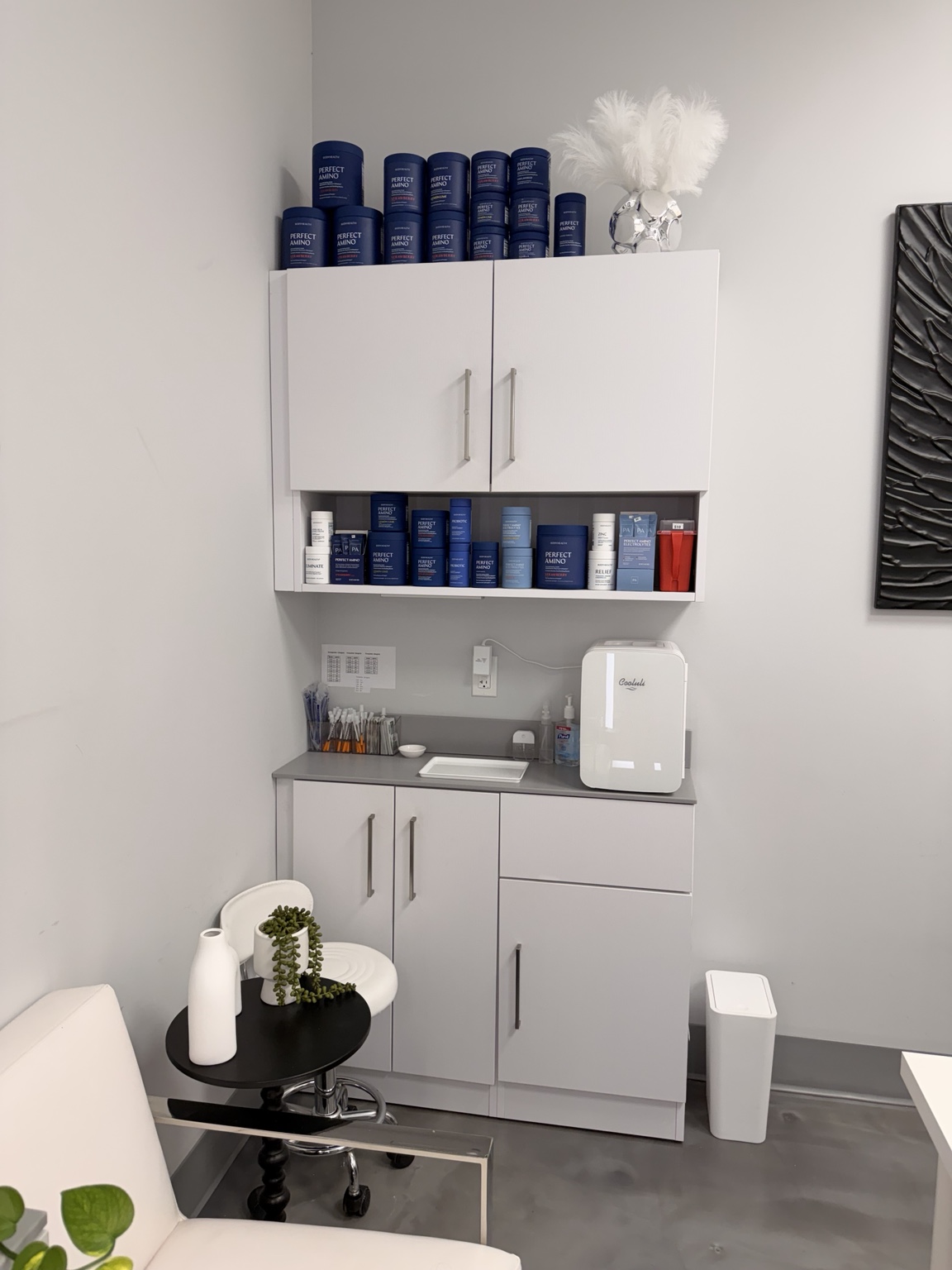 BodyHealth PerfectAmino and wellness products displayed inside the Pure Wellness clinic in Cape Coral
